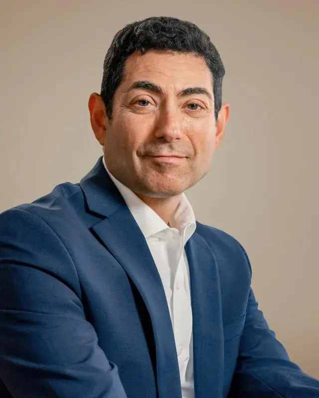 Portrait of Mariano-Florentino (Tino) Cuéllar, Chief Global Affairs Officer at Anthropic